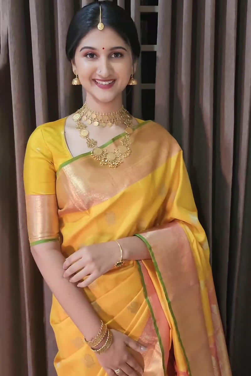 Stylish Yellow Soft Silk Saree With A dreamy Blouse Piece