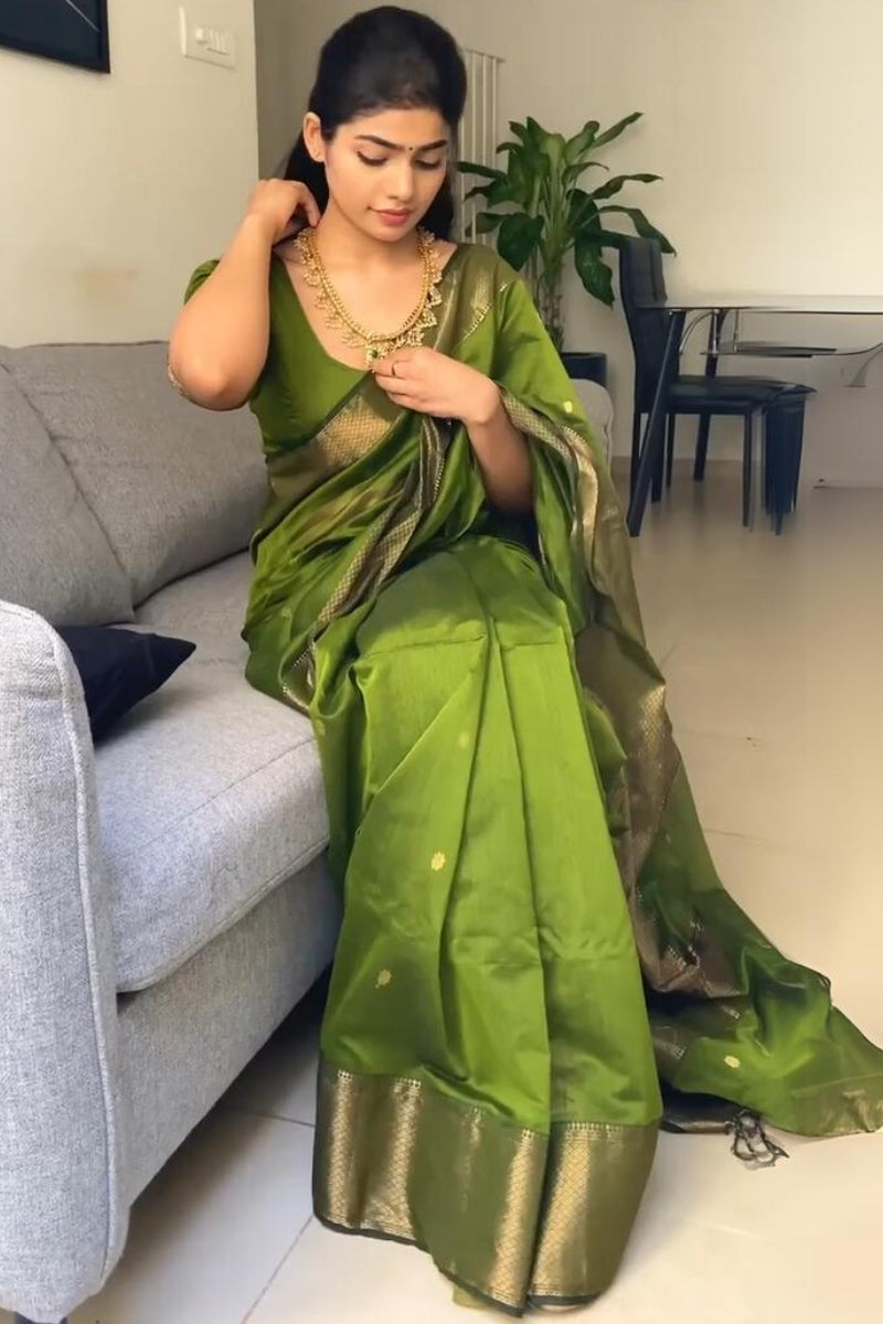 Ethnic Green Cotton Silk Saree With Invaluable Blouse Piece