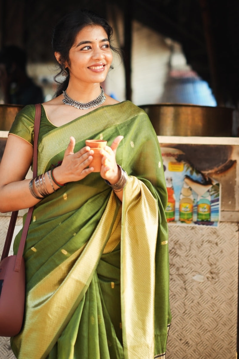 Prettiest Green Cotton Silk Saree With Gorgeous Blouse Piece