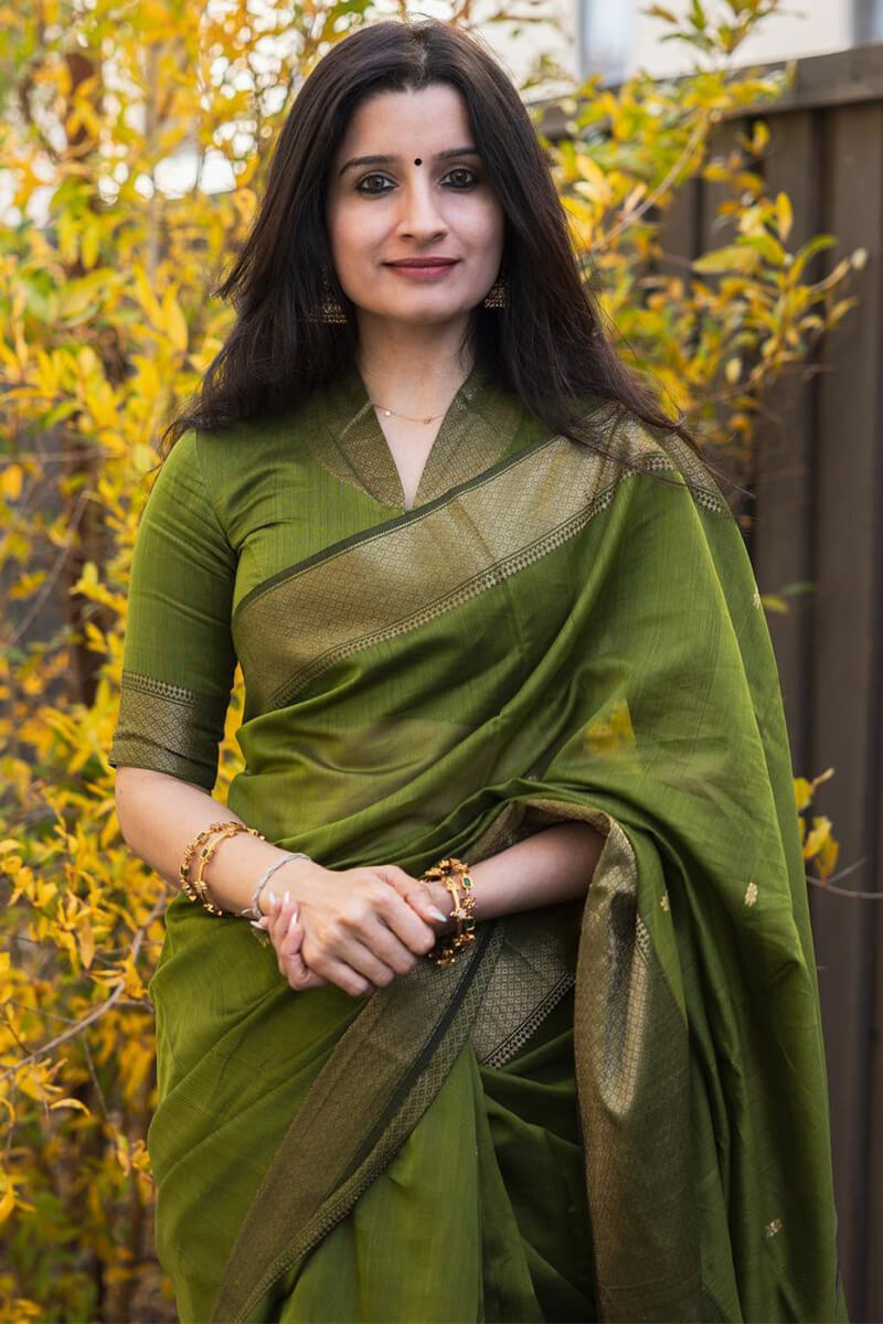 Tempting Green Cotton Silk Saree With Embellished Blouse Piece