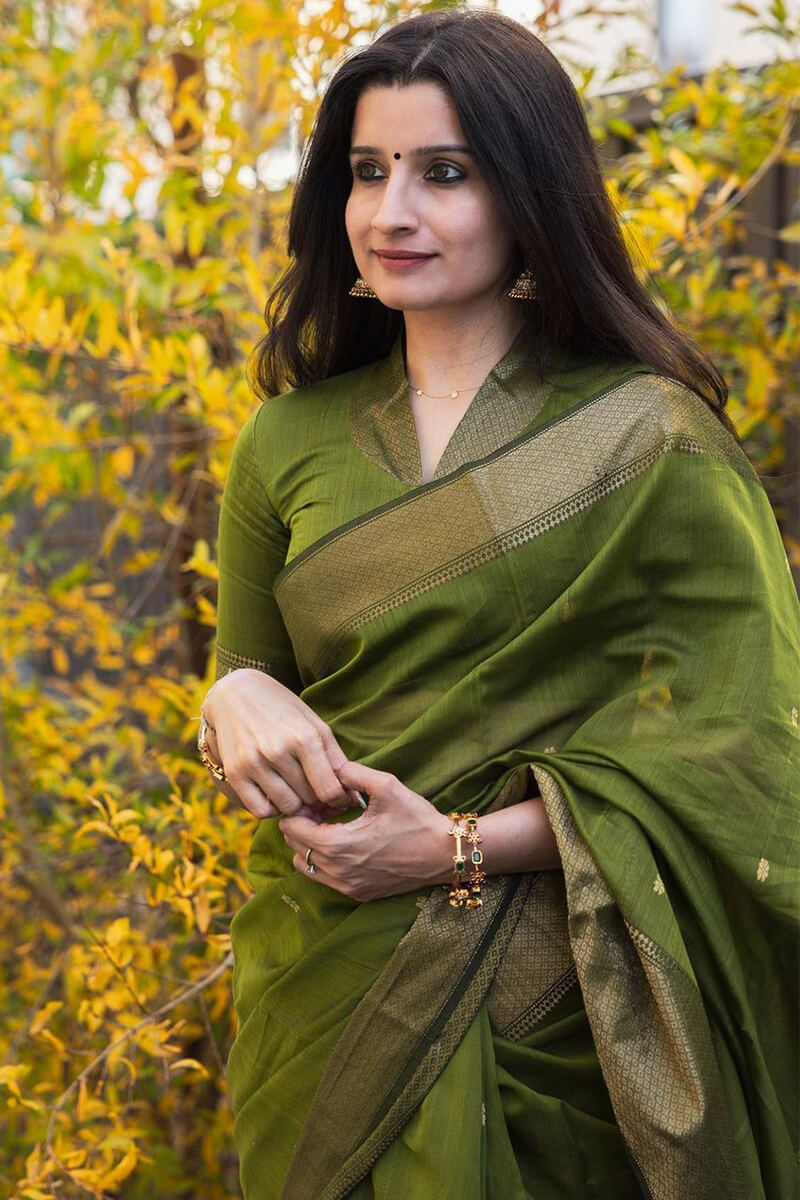 Tempting Green Cotton Silk Saree With Embellished Blouse Piece