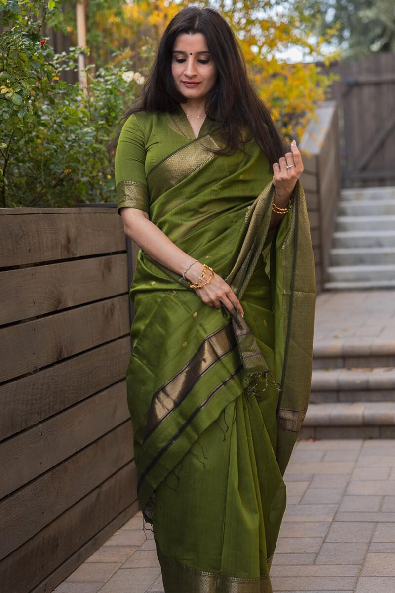 Tempting Green Cotton Silk Saree With Embellished Blouse Piece