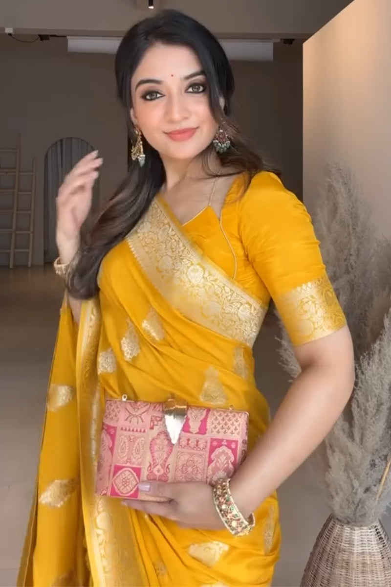 Gratifying Yellow Soft Silk Saree With Desirable Blouse Piece