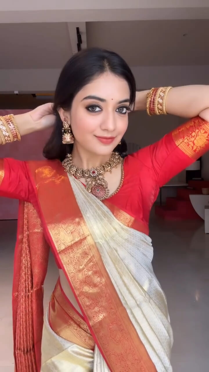 Opulent Beige Soft Banarasi Silk Saree With Diaphanous Blouse Piece