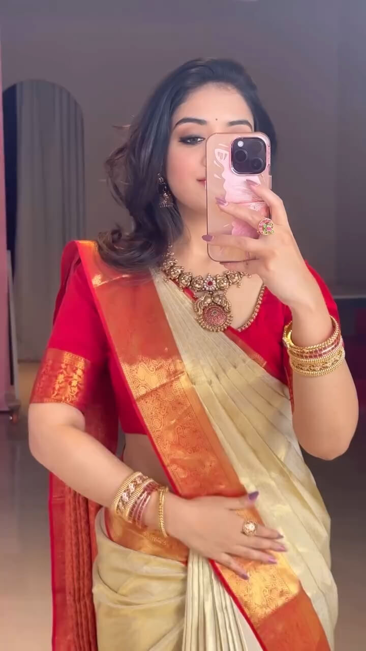 Opulent Beige Soft Banarasi Silk Saree With Diaphanous Blouse Piece