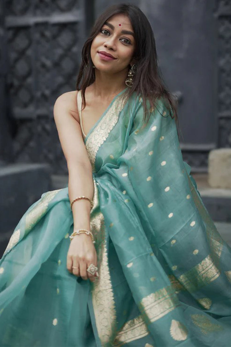 Vivacious Turquoise Linen Silk Saree With Incomparable Blouse Piece