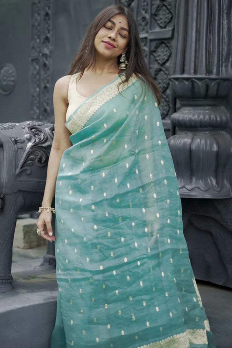 Vivacious Turquoise Linen Silk Saree With Incomparable Blouse Piece