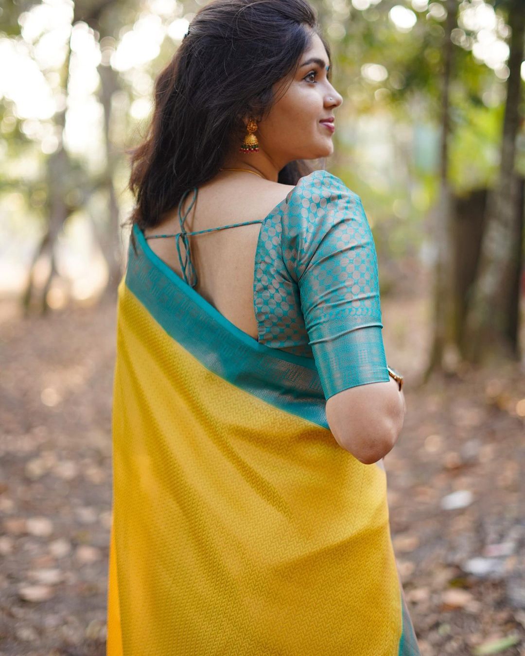 Demanding Yellow Soft Silk Saree With Delightful Blouse Piece