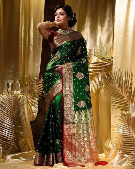 Trendy Dark Green Soft Silk Saree With Charismatic Blouse Piece