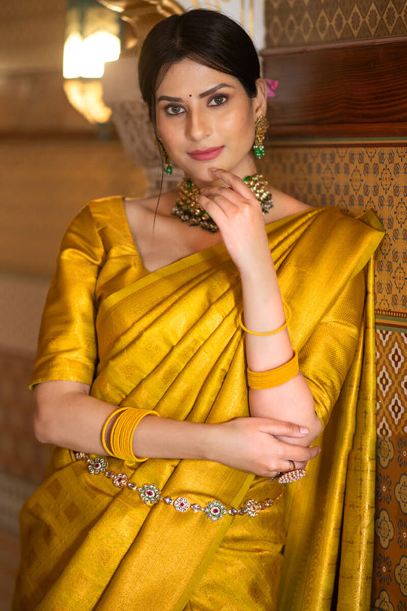 Deserving Yellow Soft Silk Saree With Elegant Blouse Piece
