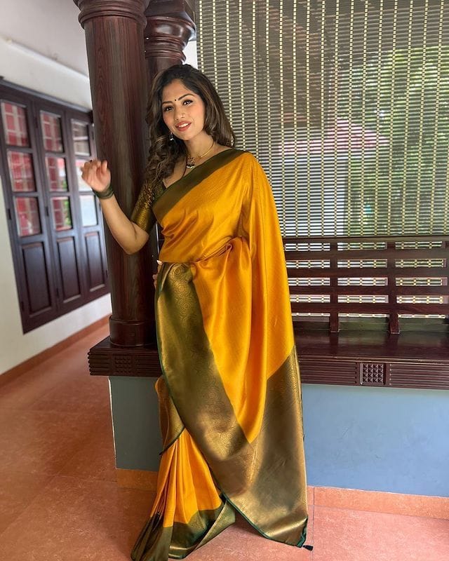 Glowing Yellow Soft Silk Saree with Hypnotic Blouse Piece