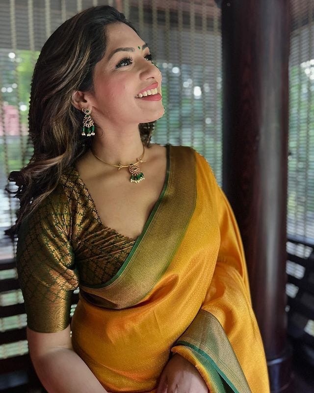 Glowing Yellow Soft Silk Saree with Hypnotic Blouse Piece