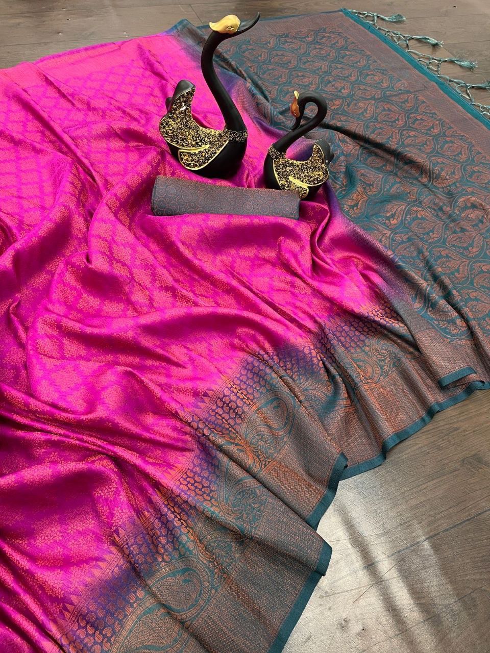 Staring Dark Pink Soft Banarasi Silk Saree With Enchanting Blouse Piece