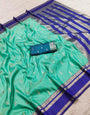 Rhapsodic Firozi Pure Zari Weaving Banarasi Silk Saree With Embellished Blouse Piece