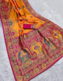 Engrossing Orange Pashmina Saree With A glam Blouse Piece