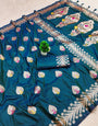 Demanding Teal Blue Soft Banarasi Silk Saree With Demure Blouse Piece