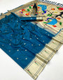 Ephemeral Rama Paithani Silk Saree With Supernal Blouse Piece