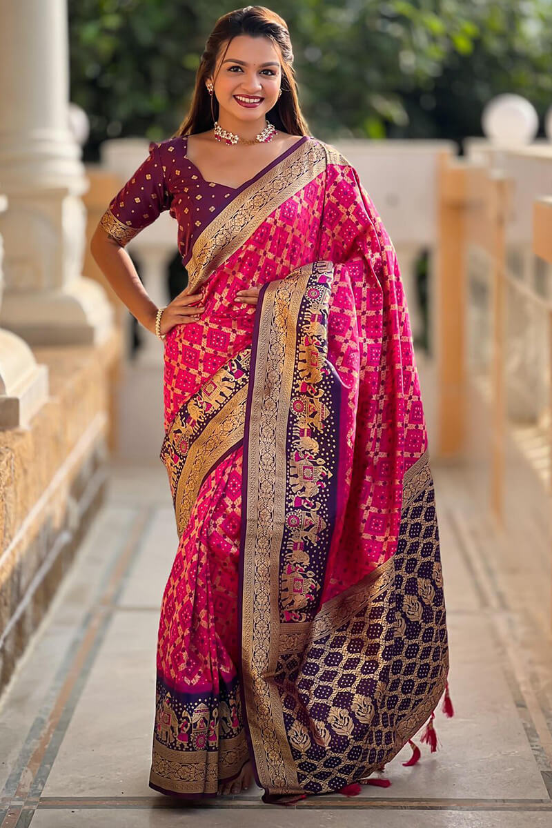 Intricate Dark Pink Patola Silk Saree with Unique Blouse Piece