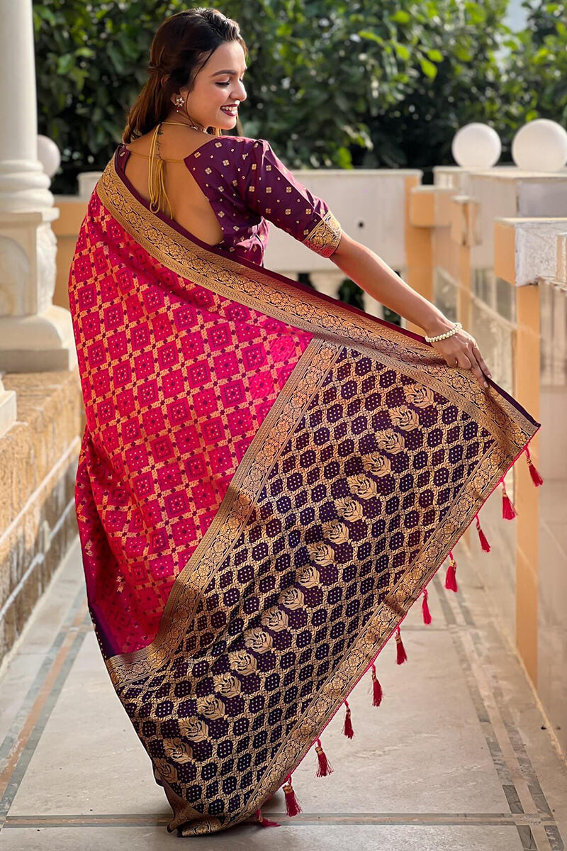 Intricate Dark Pink Patola Silk Saree with Unique Blouse Piece