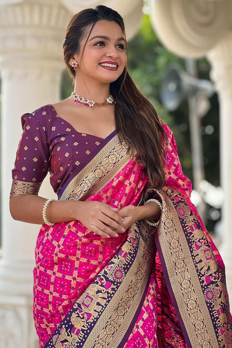 Intricate Dark Pink Patola Silk Saree with Unique Blouse Piece