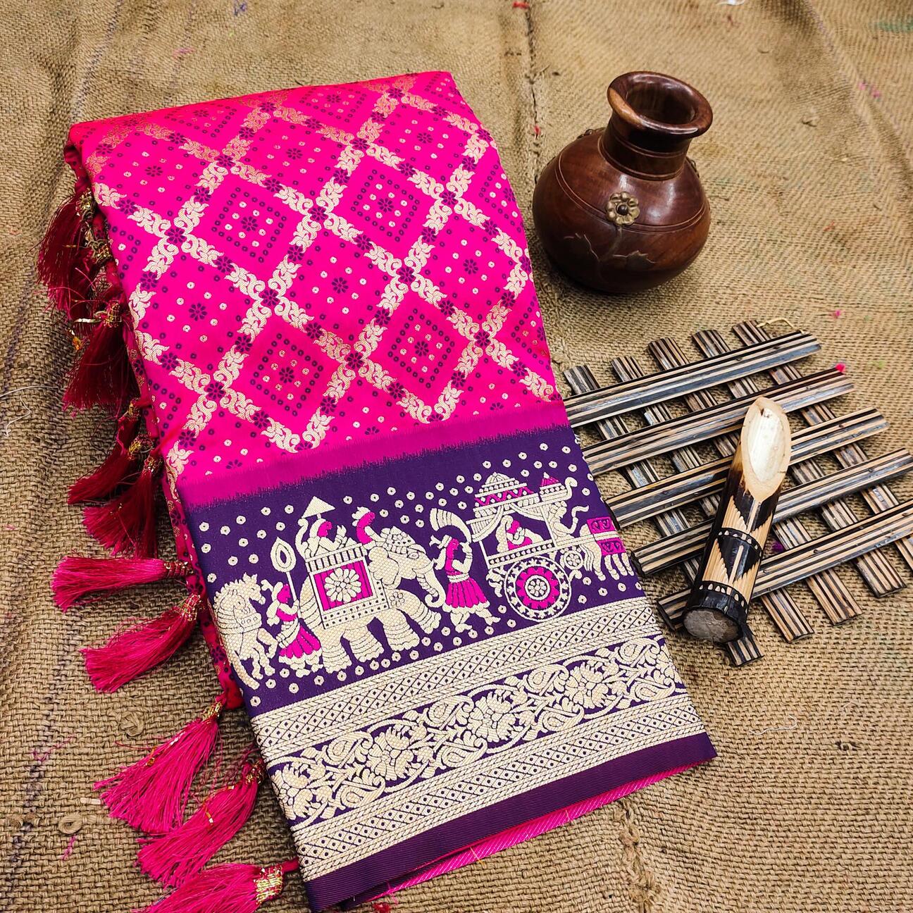 Intricate Dark Pink Patola Silk Saree with Unique Blouse Piece