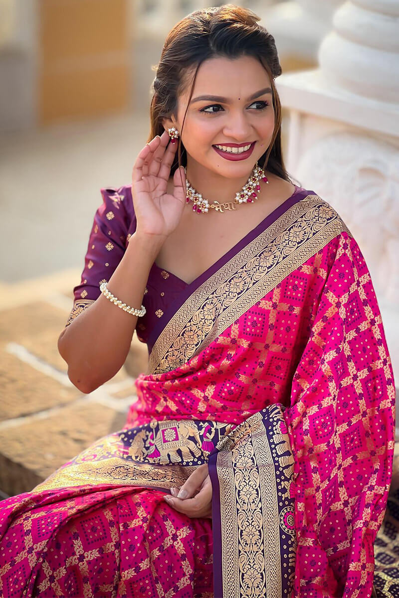 Intricate Dark Pink Patola Silk Saree with Unique Blouse Piece