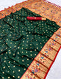 Evocative Dark Green Paithani Silk Saree With Symmetrical Blouse Piece