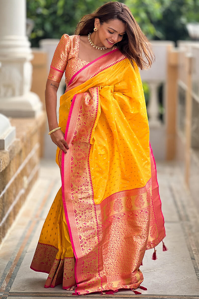 Snazzy Yellow Soft Banarasi Silk Saree With Seraglio Blouse Piece