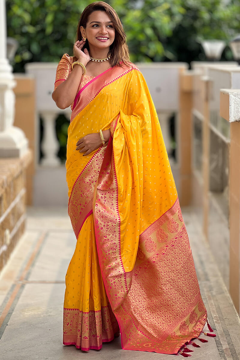 Snazzy Yellow Soft Banarasi Silk Saree With Seraglio Blouse Piece