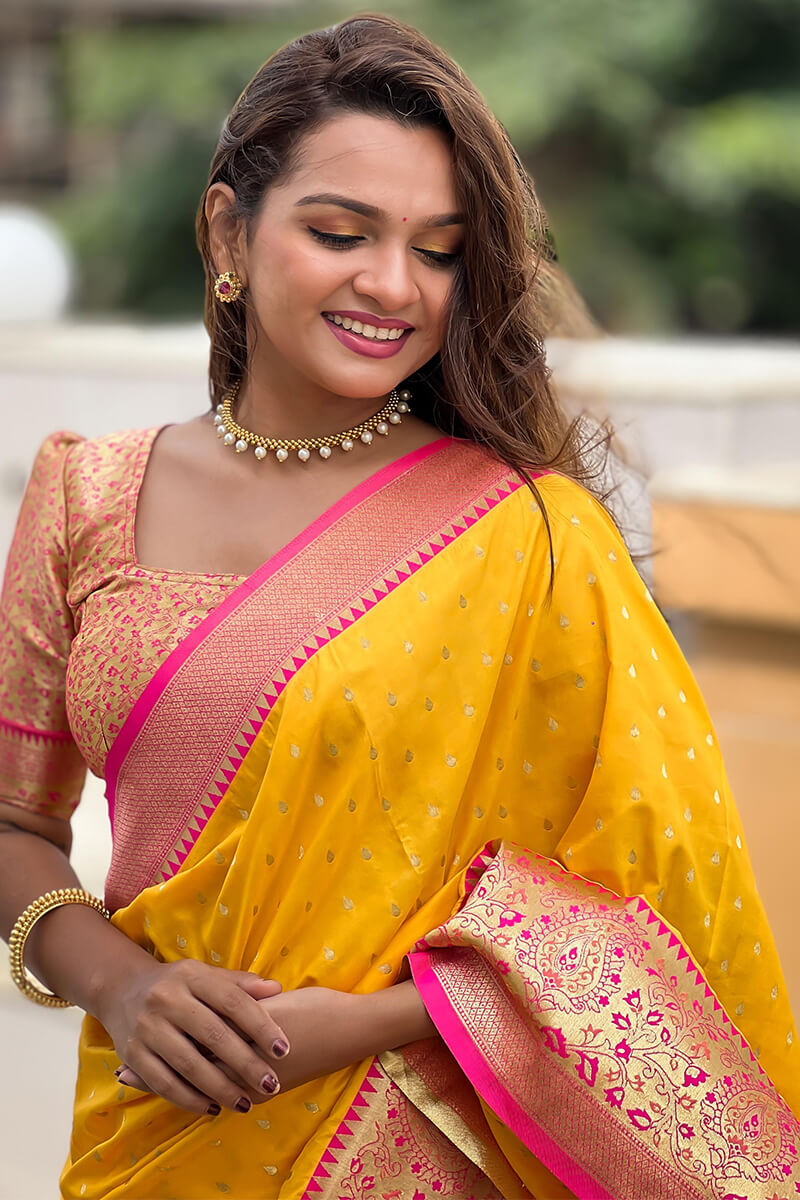 Snazzy Yellow Soft Banarasi Silk Saree With Seraglio Blouse Piece