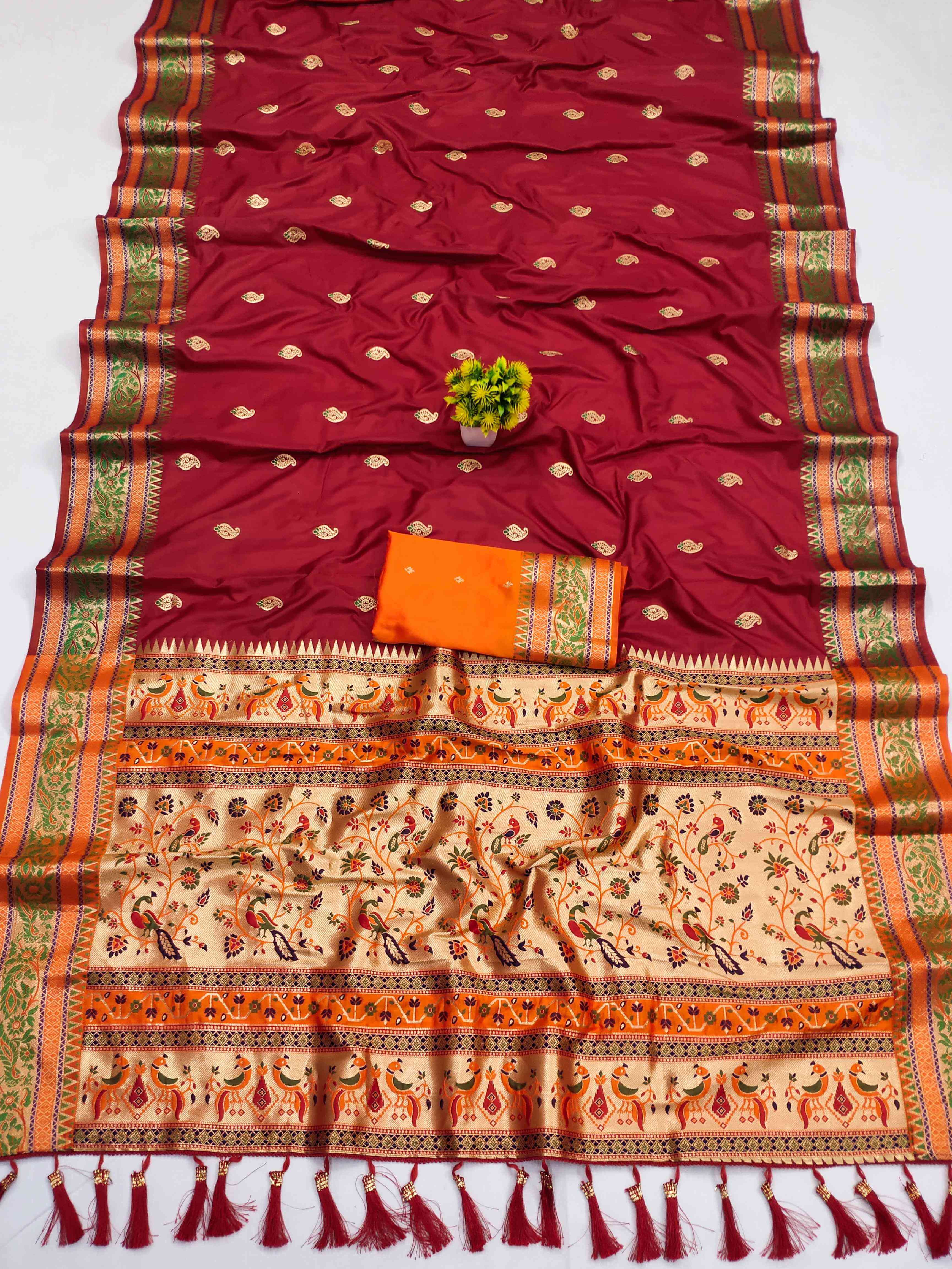 A dreamy Maroon Soft Banarasi Silk Saree With Ineffable Blouse Piece