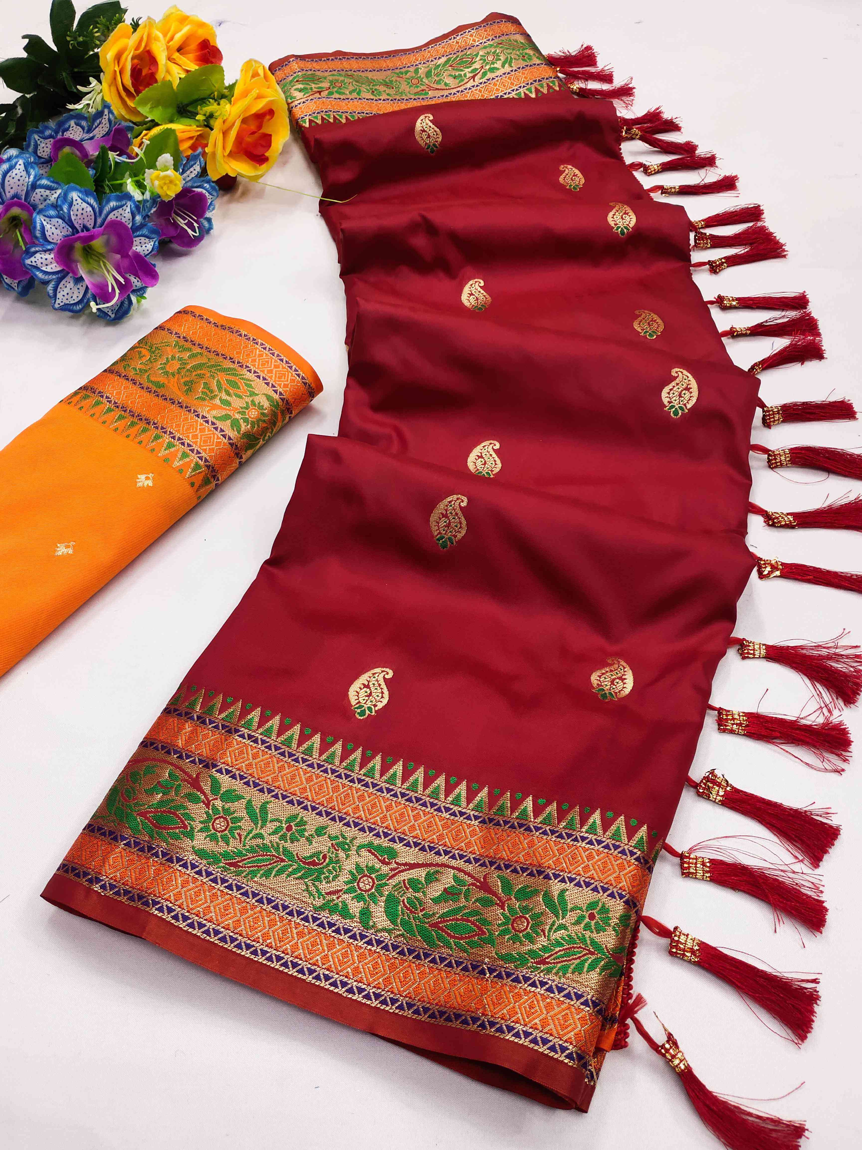 A dreamy Maroon Soft Banarasi Silk Saree With Ineffable Blouse Piece