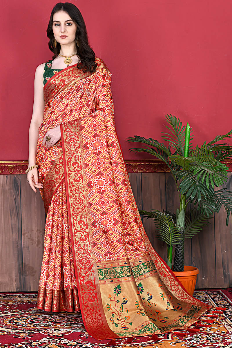 Glowing Red Patola Silk Saree with Energetic Blouse Piece