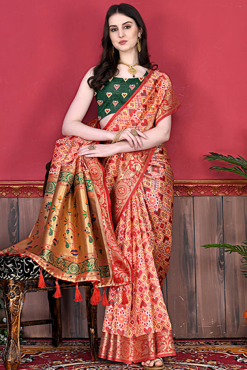 Glowing Red Patola Silk Saree with Energetic Blouse Piece