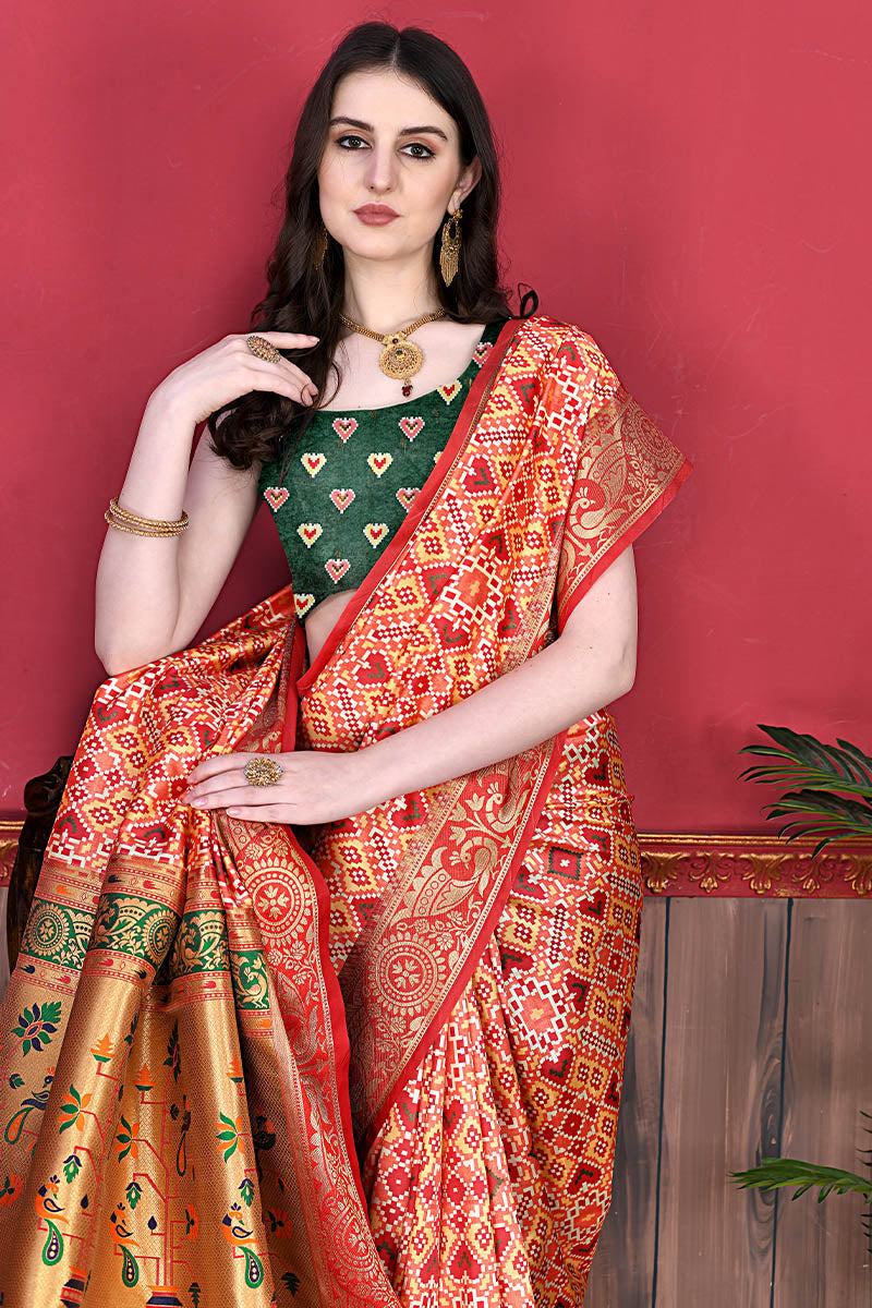 Glowing Red Patola Silk Saree with Energetic Blouse Piece