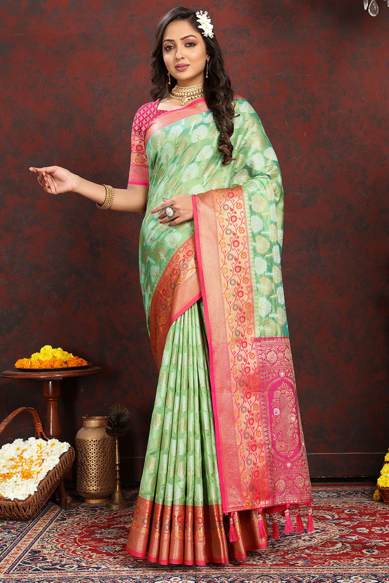 Exuberant Pista Soft Banarasi Silk Saree With Snappy Blouse Piece