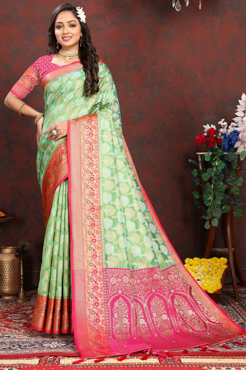 Exuberant Pista Soft Banarasi Silk Saree With Snappy Blouse Piece