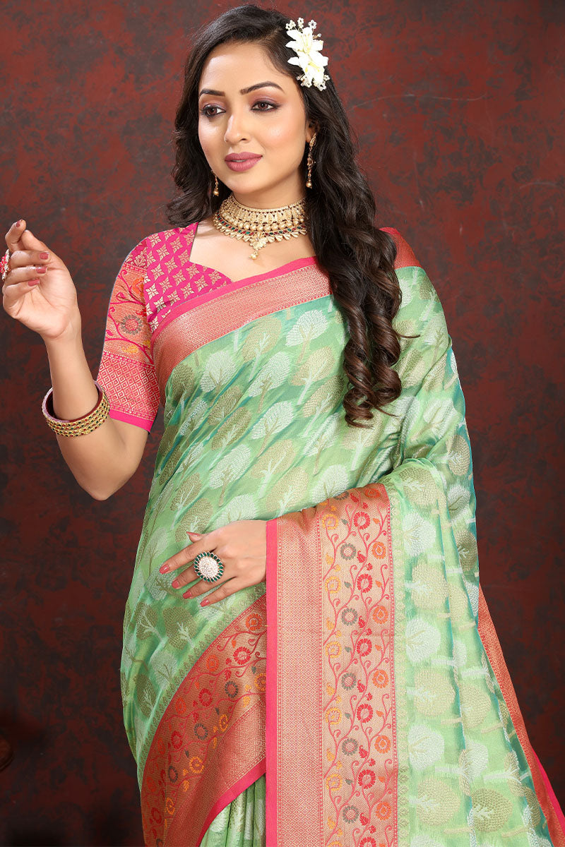 Exuberant Pista Soft Banarasi Silk Saree With Snappy Blouse Piece