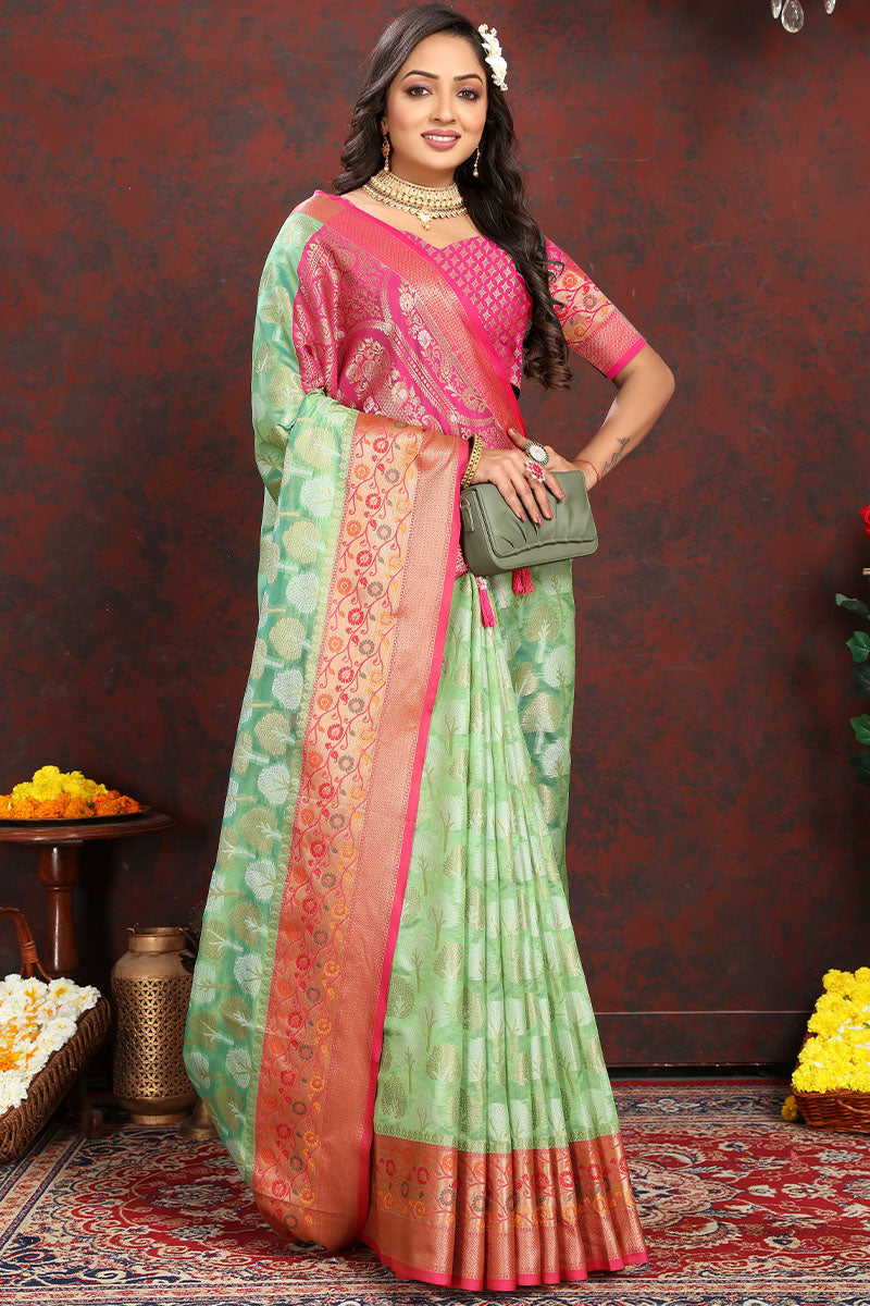 Exuberant Pista Soft Banarasi Silk Saree With Snappy Blouse Piece