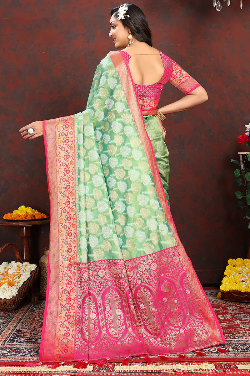 Exuberant Pista Soft Banarasi Silk Saree With Snappy Blouse Piece