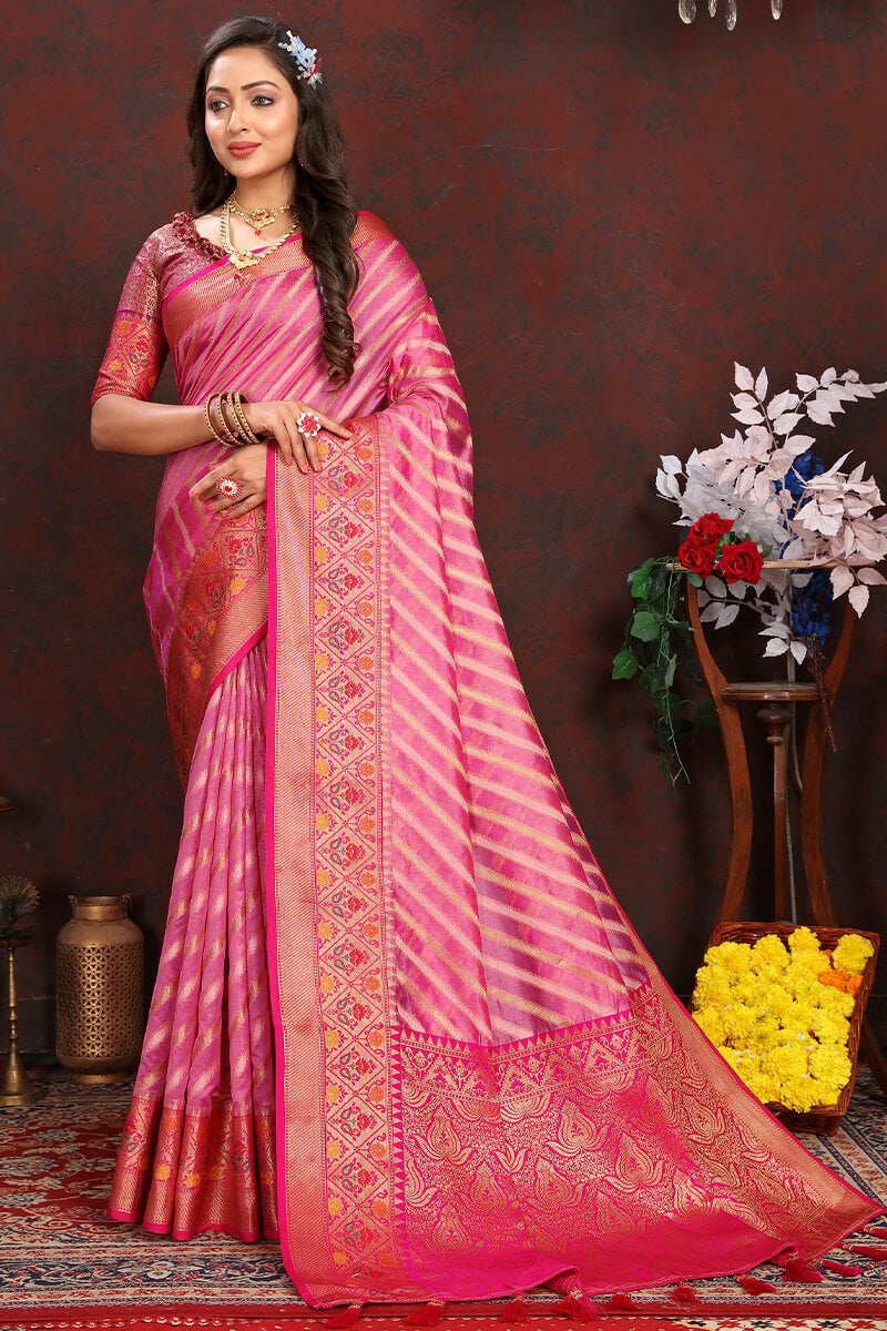Conflate Pink Soft Banarasi Silk Saree With Super extravagant Blouse Piece