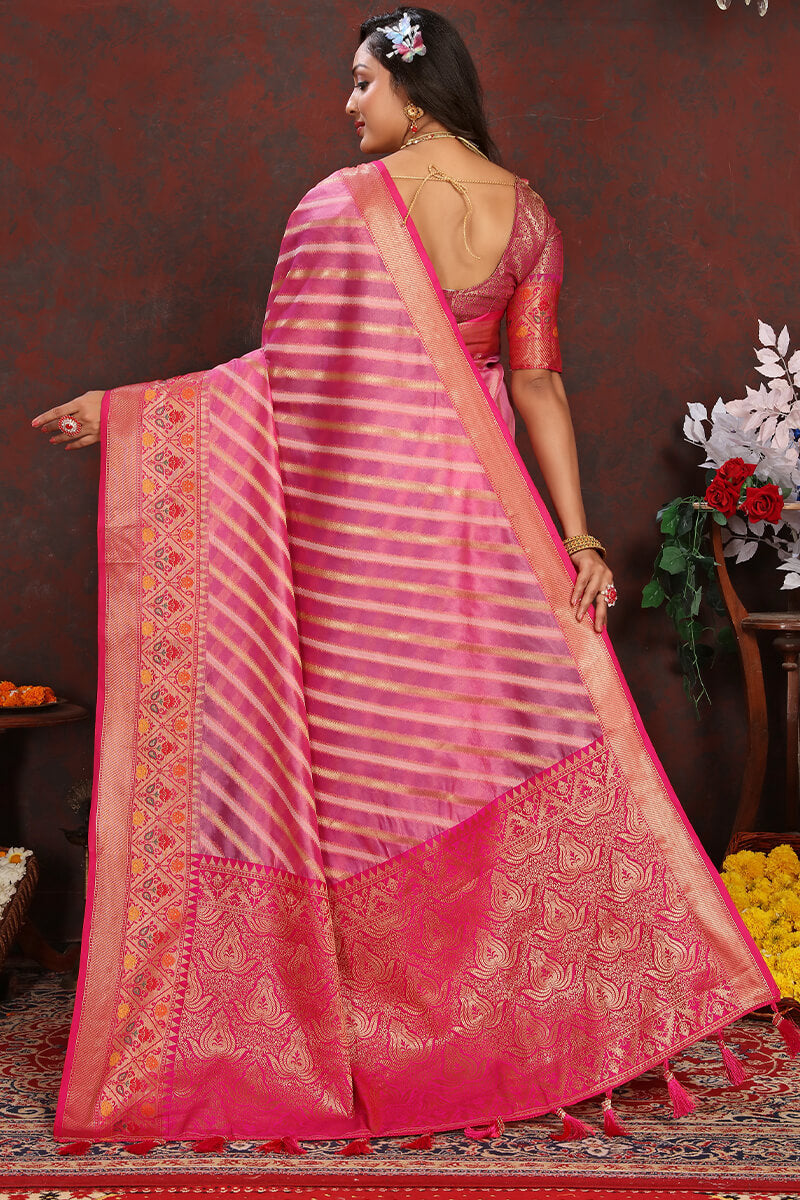 Conflate Pink Soft Banarasi Silk Saree With Super extravagant Blouse Piece