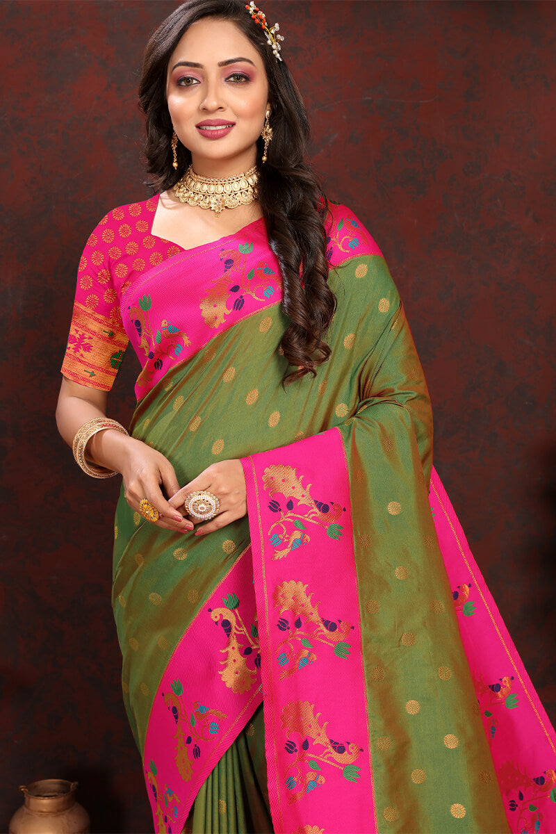 Exquisite Green Paithani Silk Saree With Fugacious Blouse Piece