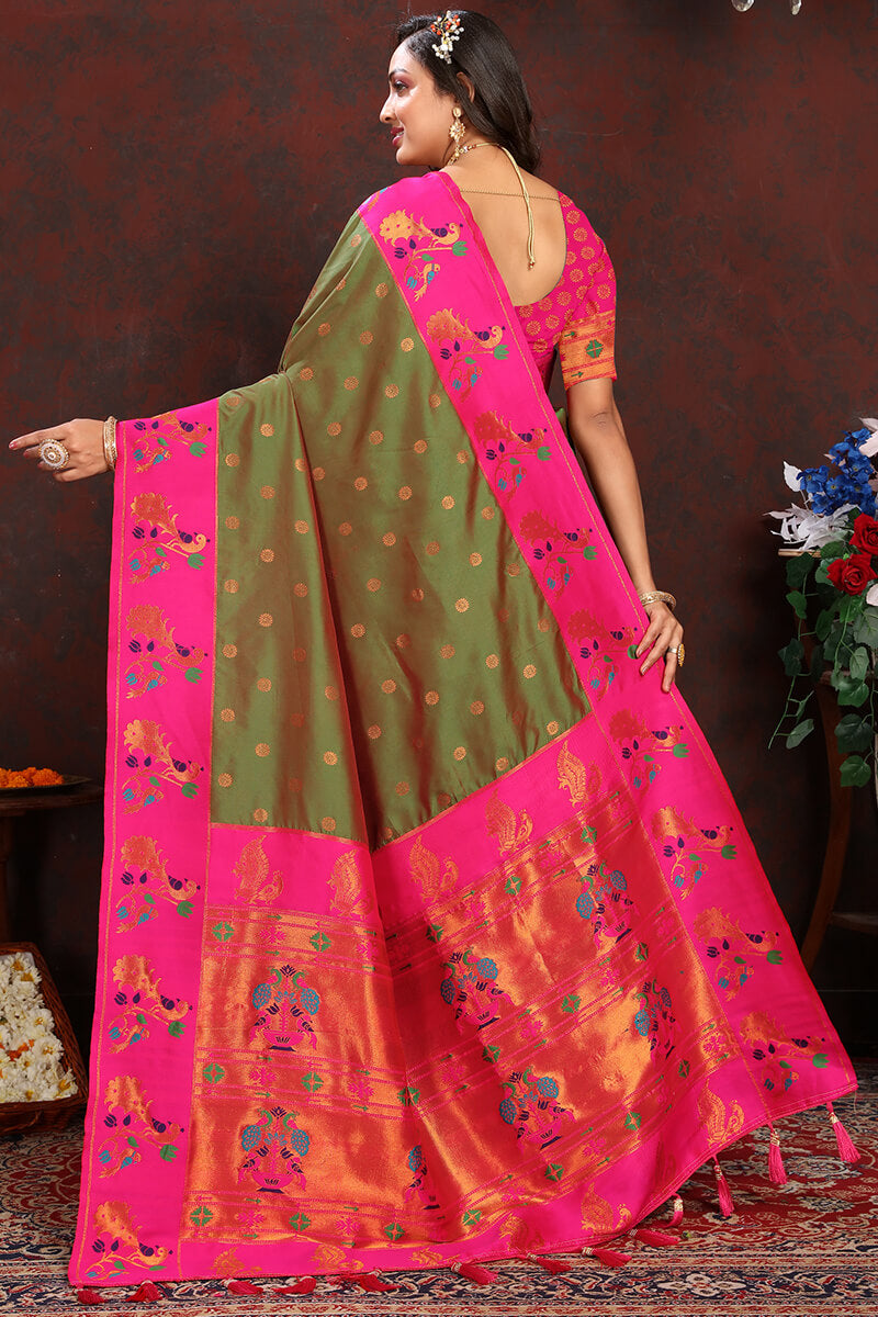 Exquisite Green Paithani Silk Saree With Fugacious Blouse Piece