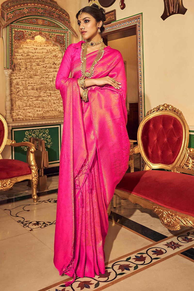 Intricate Dark Pink Kanjivaram Silk Saree With Groovy Blouse Piece