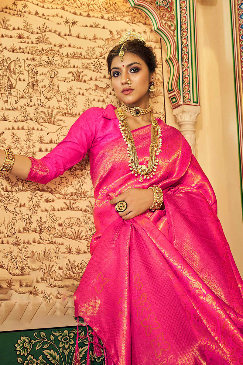 Intricate Dark Pink Kanjivaram Silk Saree With Groovy Blouse Piece