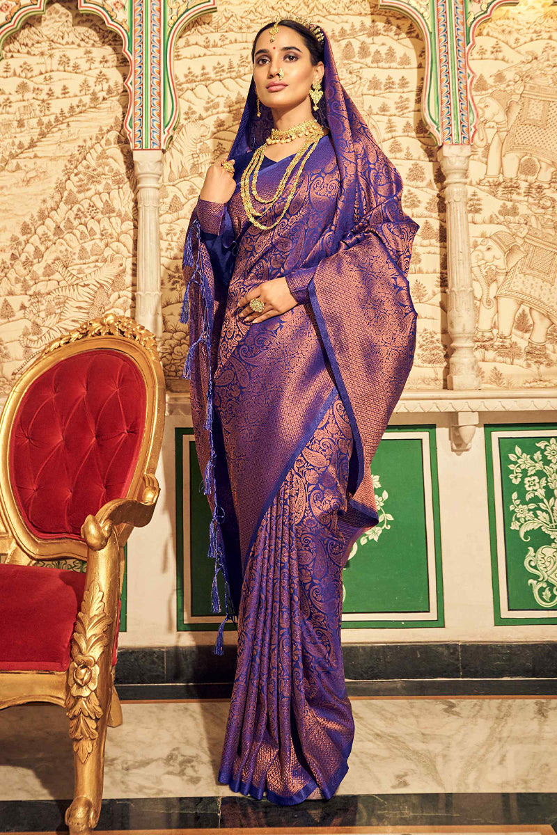 Enamoring Royal Blue Kanjivaram Silk Saree With Grandiose Blouse Piece