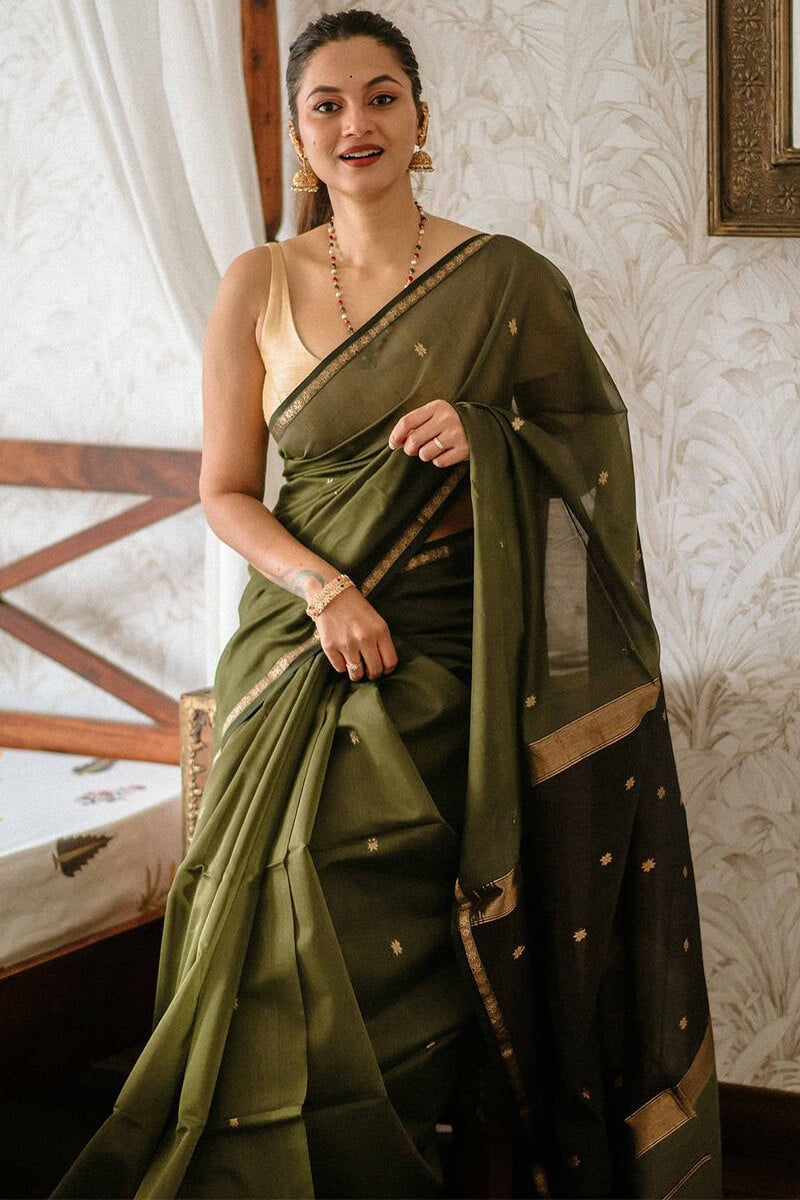 Pleasant Green Cotton Silk Saree With Conflate Blouse Piece