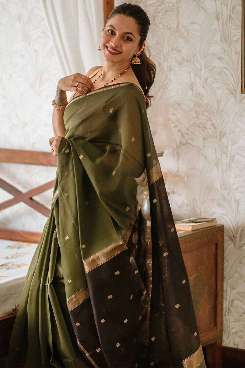 Pleasant Green Cotton Silk Saree With Conflate Blouse Piece