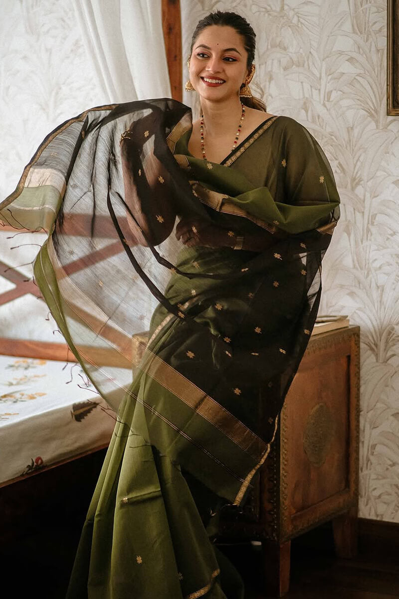 Pleasant Green Cotton Silk Saree With Conflate Blouse Piece